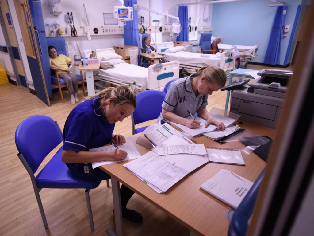 Members of clinical staff complete paperwork in the Accident and Emergency department of the 'Royal Albert Edward Infirmary' in Wigan, Lancashire UK. Photo Getty.