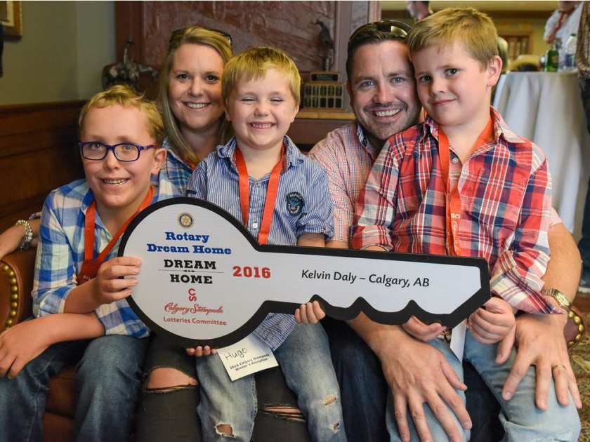 Fionn, Tina, Hugo, Kelvin, and Rhys Daly celebrate winning the Stampede Lottery Dream Home during a reception at Stampede Headquarters on Tuesday, July 26, 2016