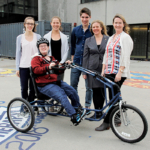 Queen's engineering students develop bicycle for teen with cerebral palsy